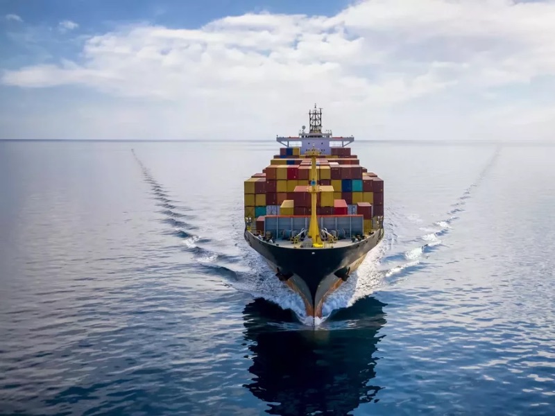 Container ship underway, seen from ahead